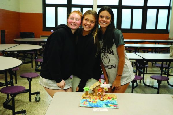 Winners Grace Skulavik, Leah Smith, and Sierra Barbosa with their winning house.